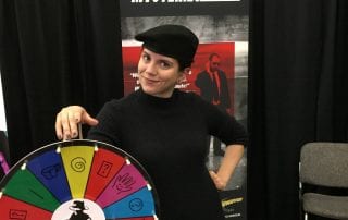 Shelby with the Wheel of Mystery at the 2019 BC Clefs D'or Tourism Showcase